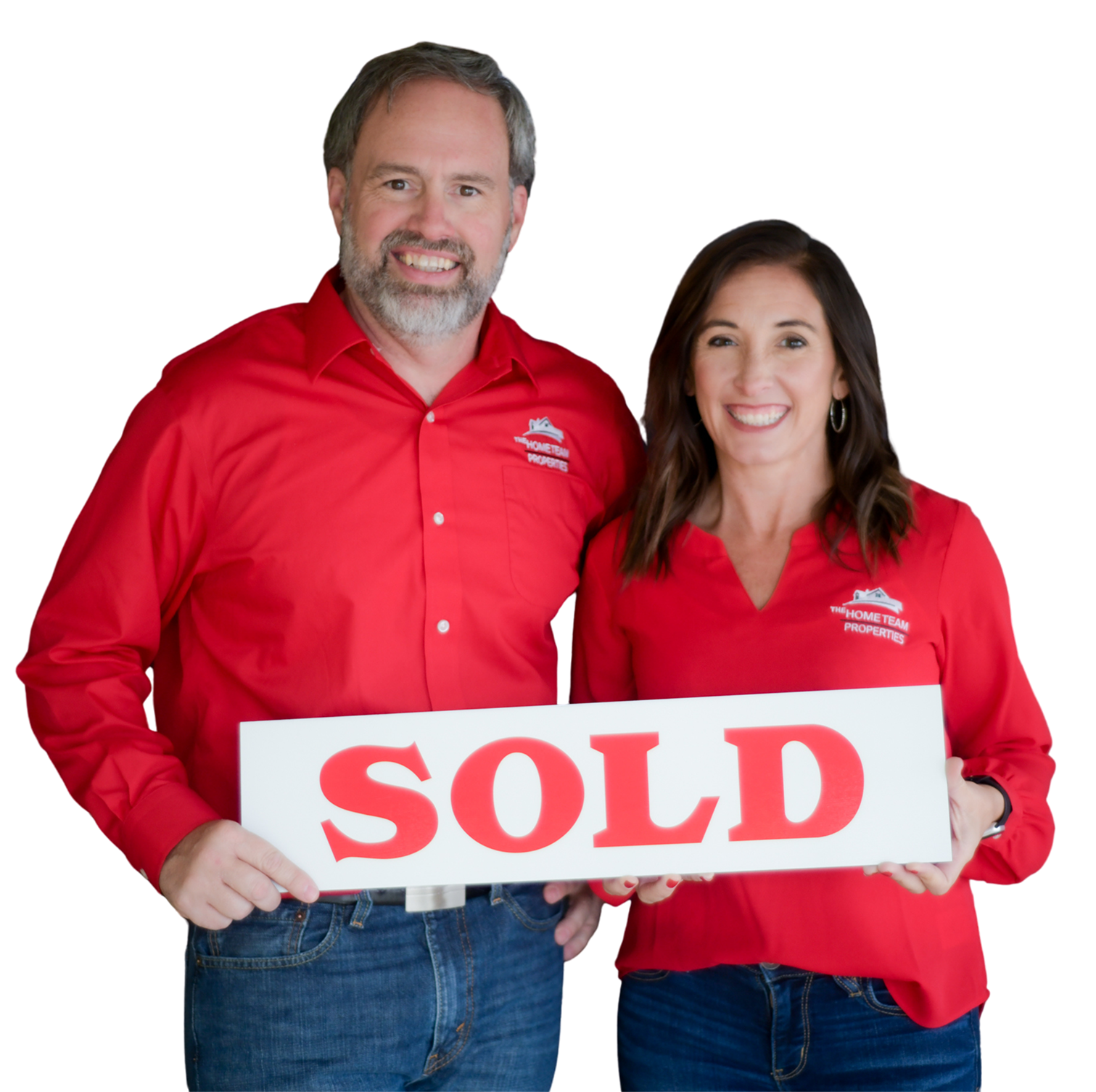 Samantha Carver and Rob Ranard holding a SOLD sign.