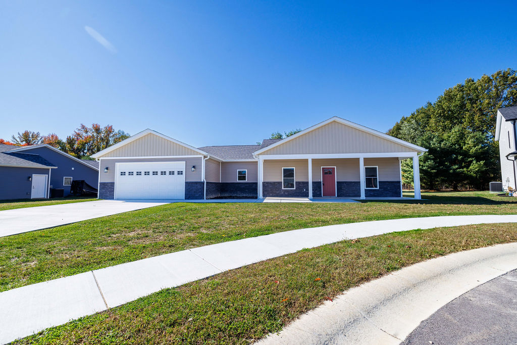 Front exterior of a single-story home with a covered porch.